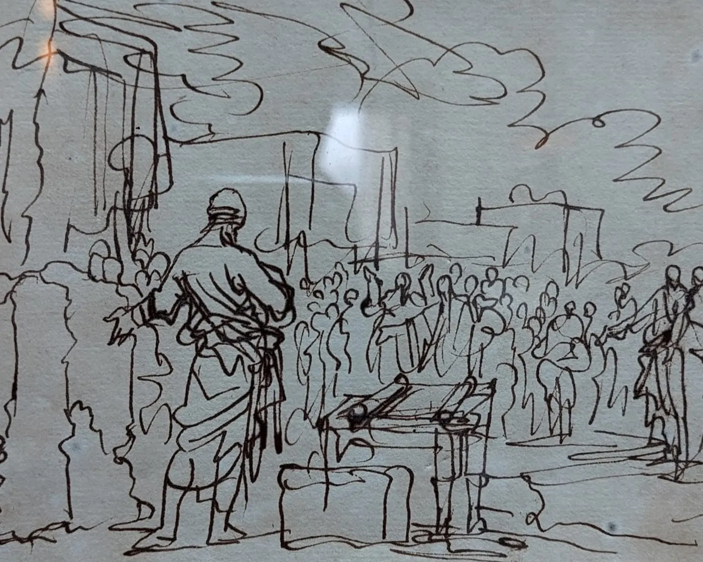 Pen drawing in brown ink of a robed figure addressing a crowd, with the note "Jos. 24" in the top corner.